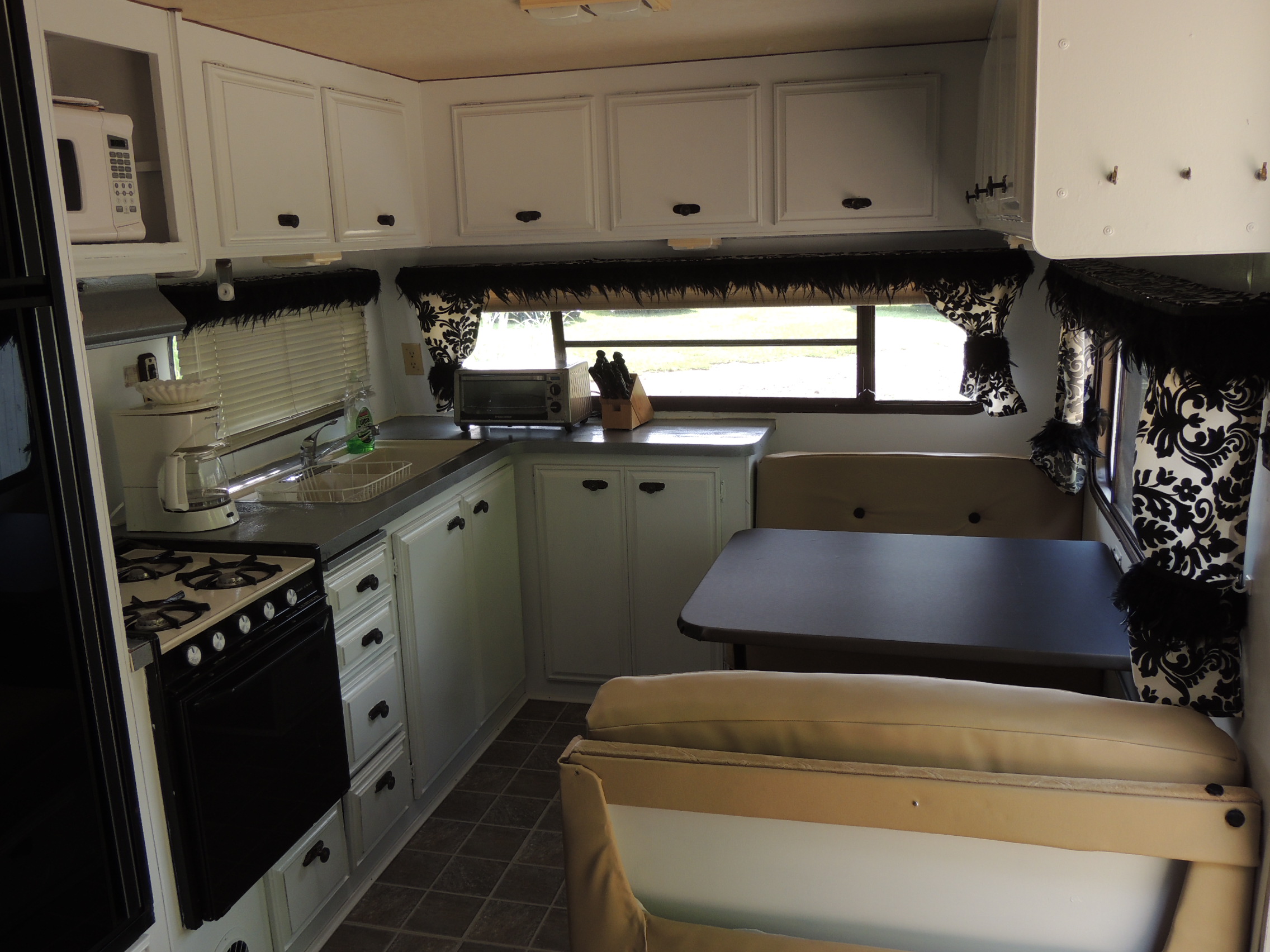Retro trailer interior view of the kitchen