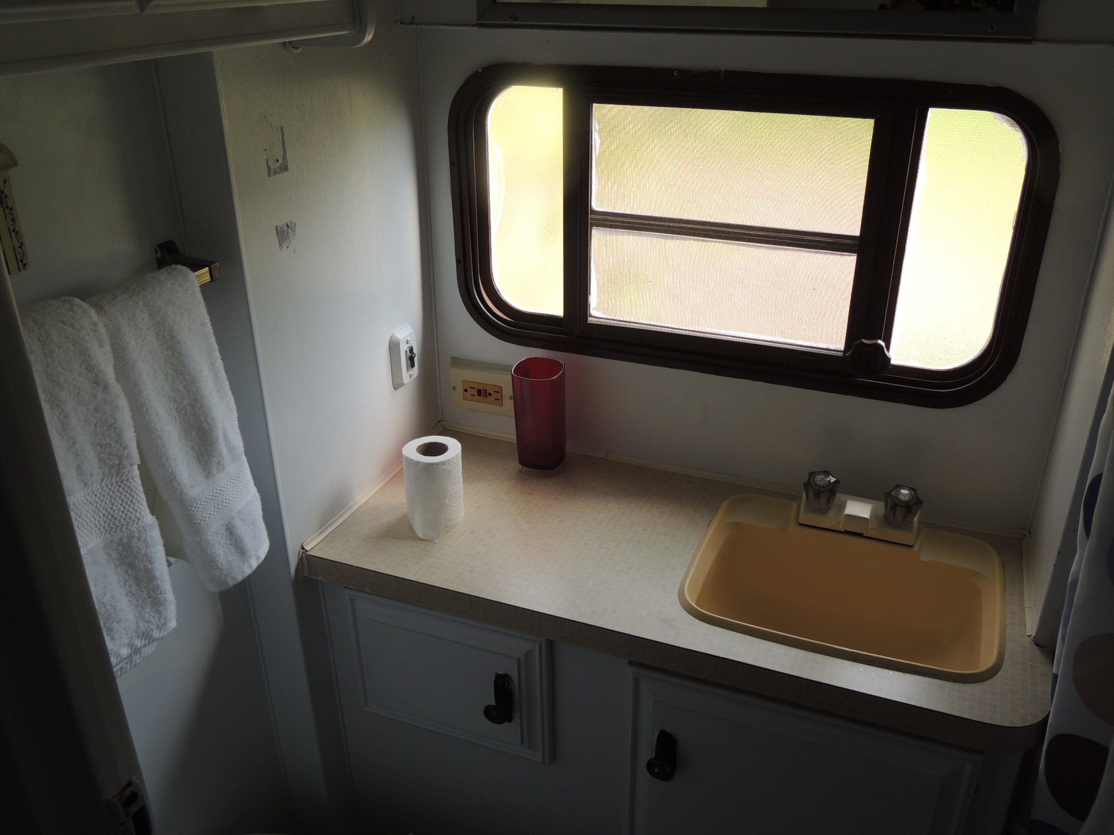 Retro trailer interior view of the bathroom vanity