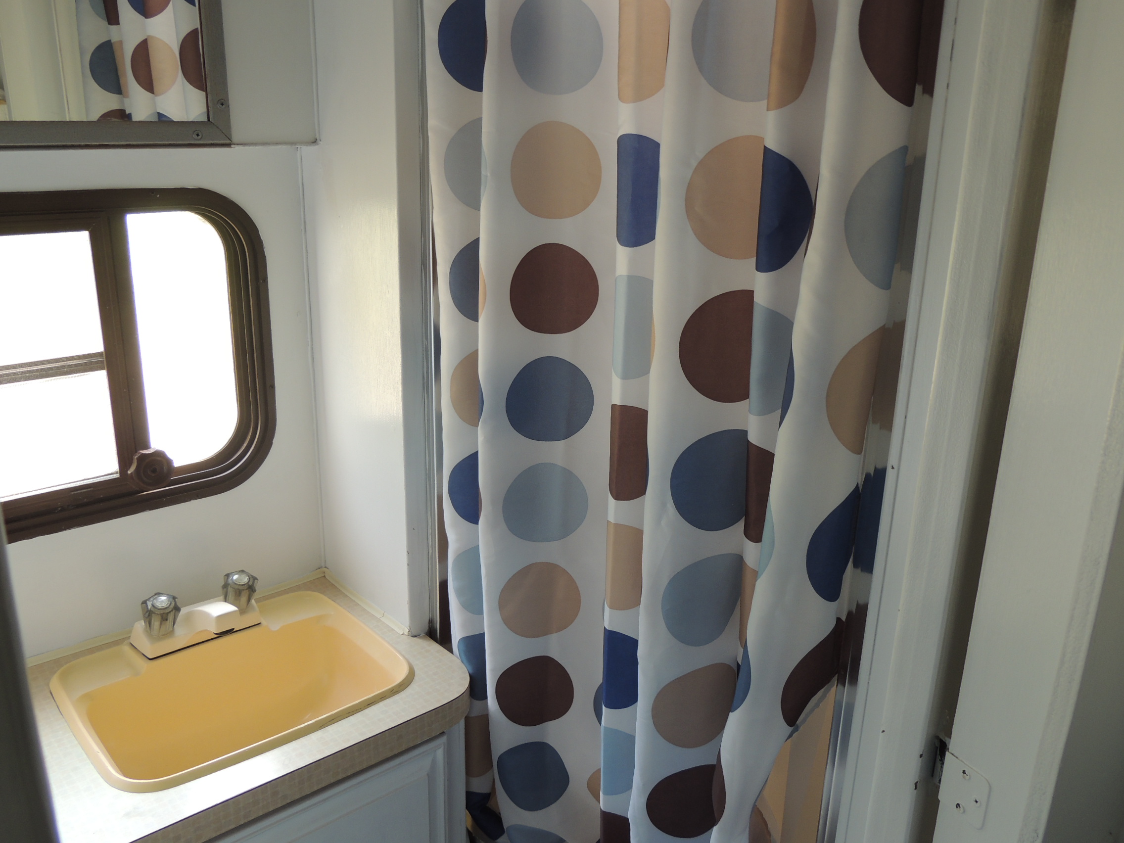 Retro trailer interior view of the private shower
