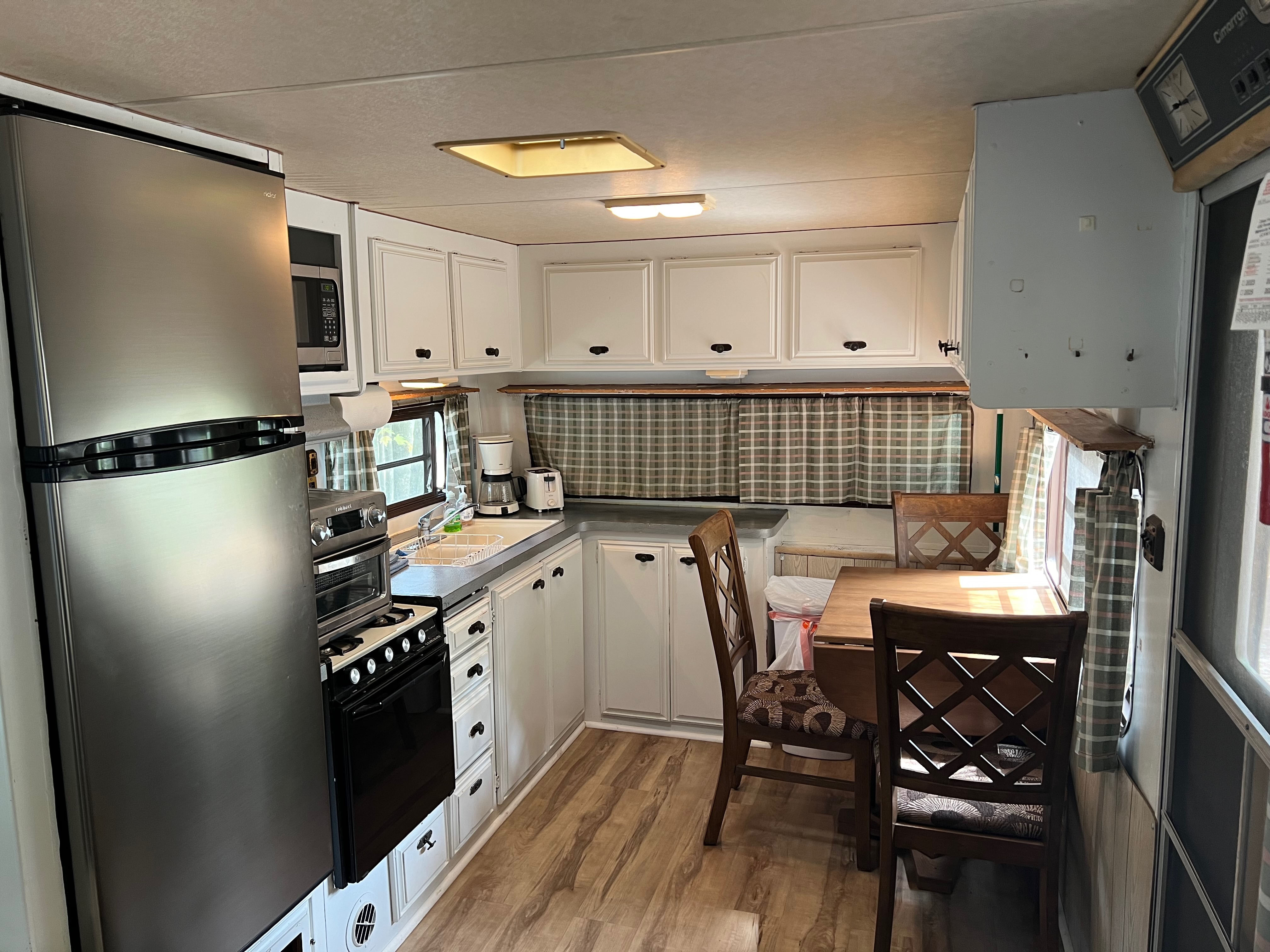 Retro trailer interior view of the kitchen